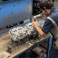 M45 Automotive technician machining a Subaru engine block in the in-house machine shop